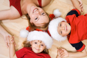 Family dressed in Santa hats