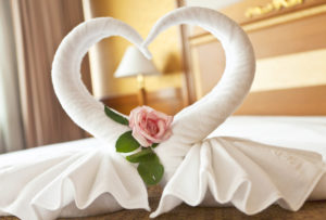 Honeymoon suite decorated with heart shaped towels